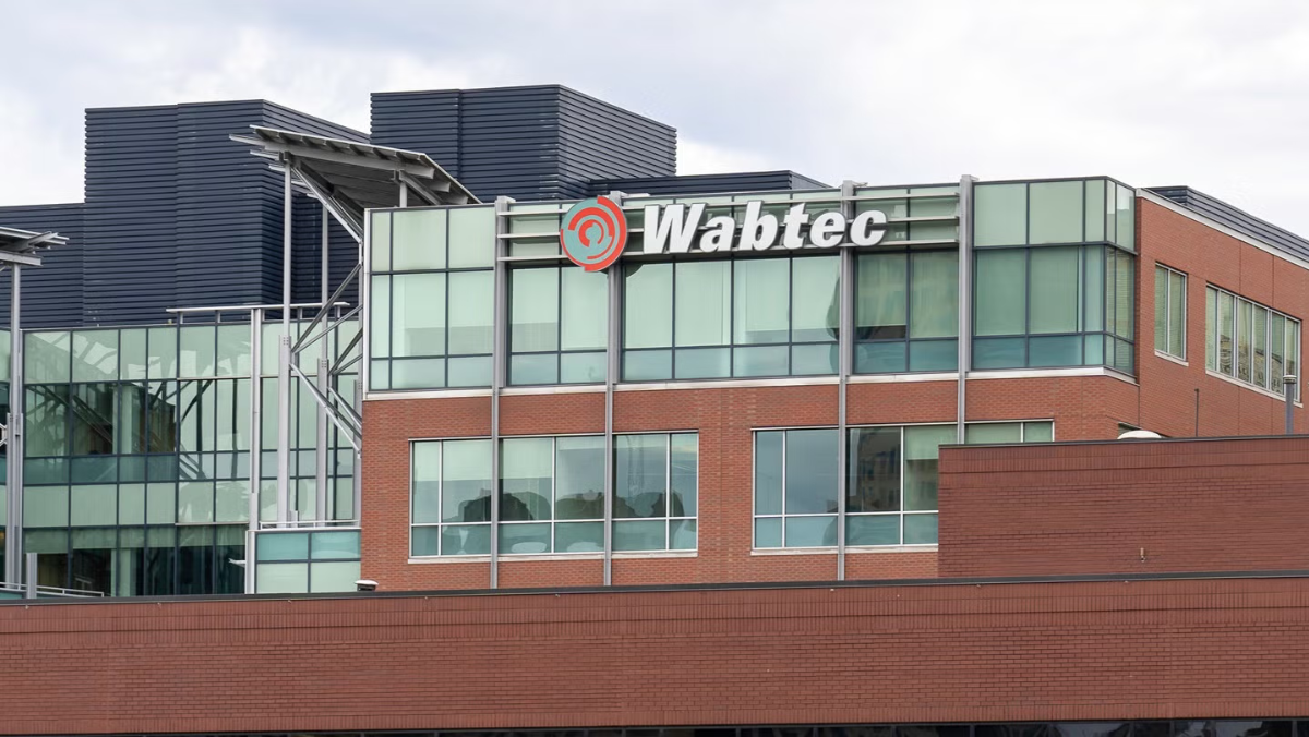 Wabtec logo displayed on the exterior of a rail technology office building
